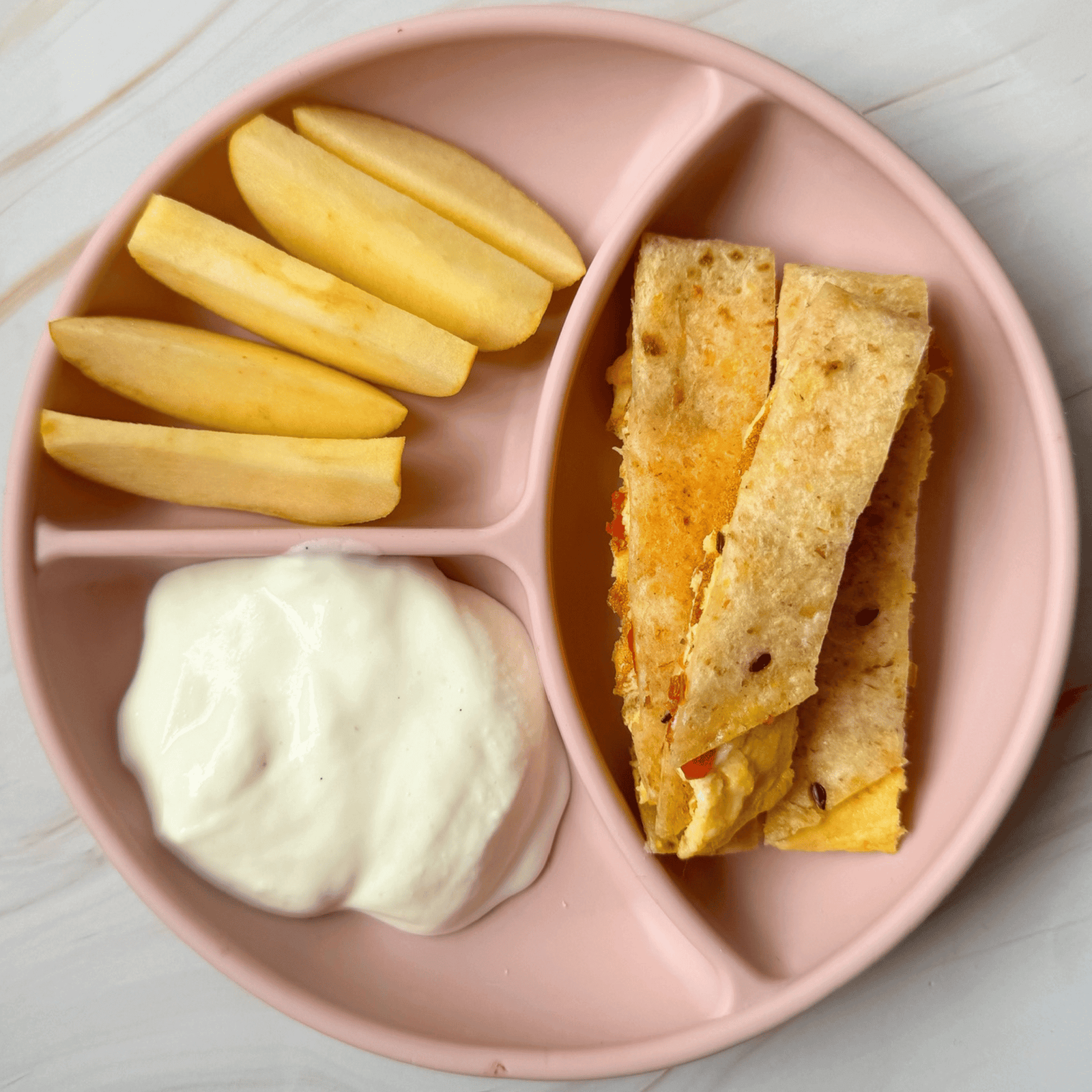 Tortilla omelette wrap served with yoghurt and apple for babies and toddlers