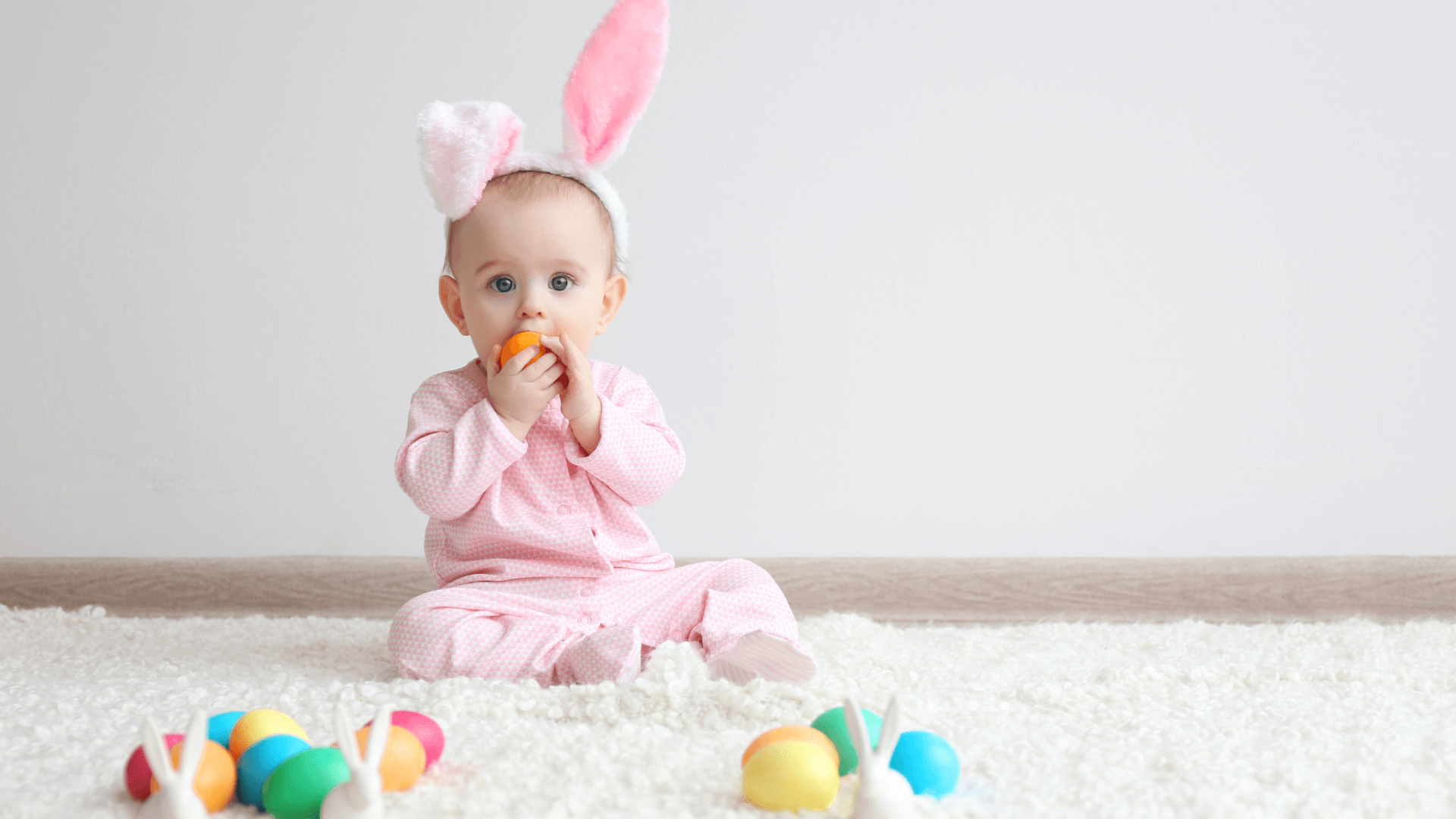 baby with easter eggs
