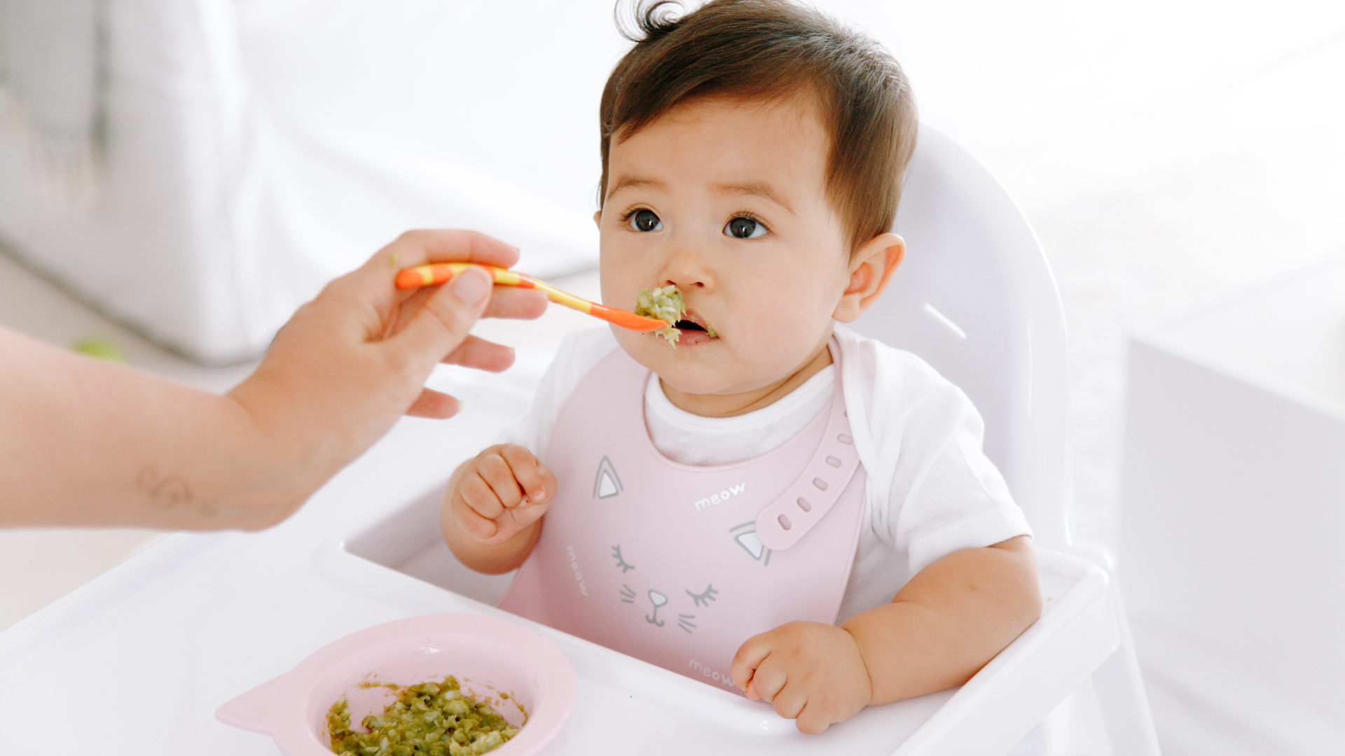 Baby eating frozen baby puree