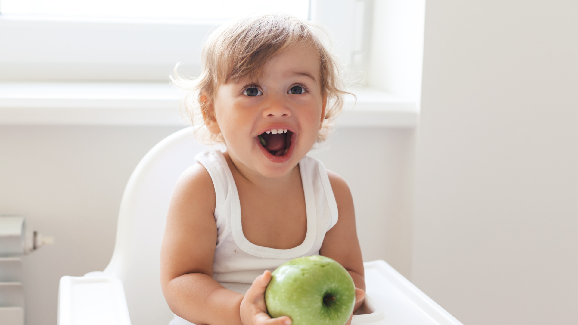 Baby eating iron-rich food