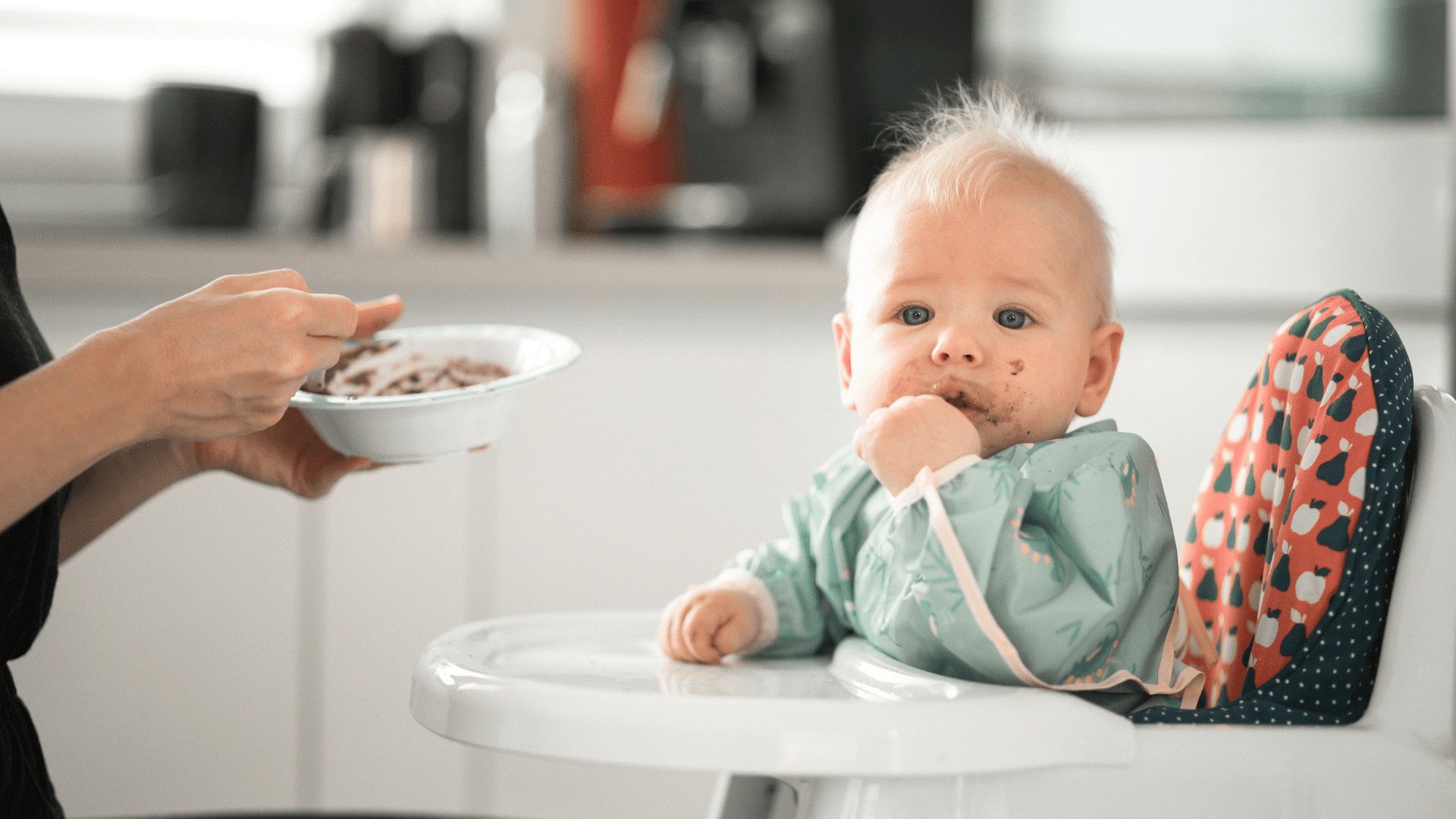 baby starting solids with infant puree at 6 months