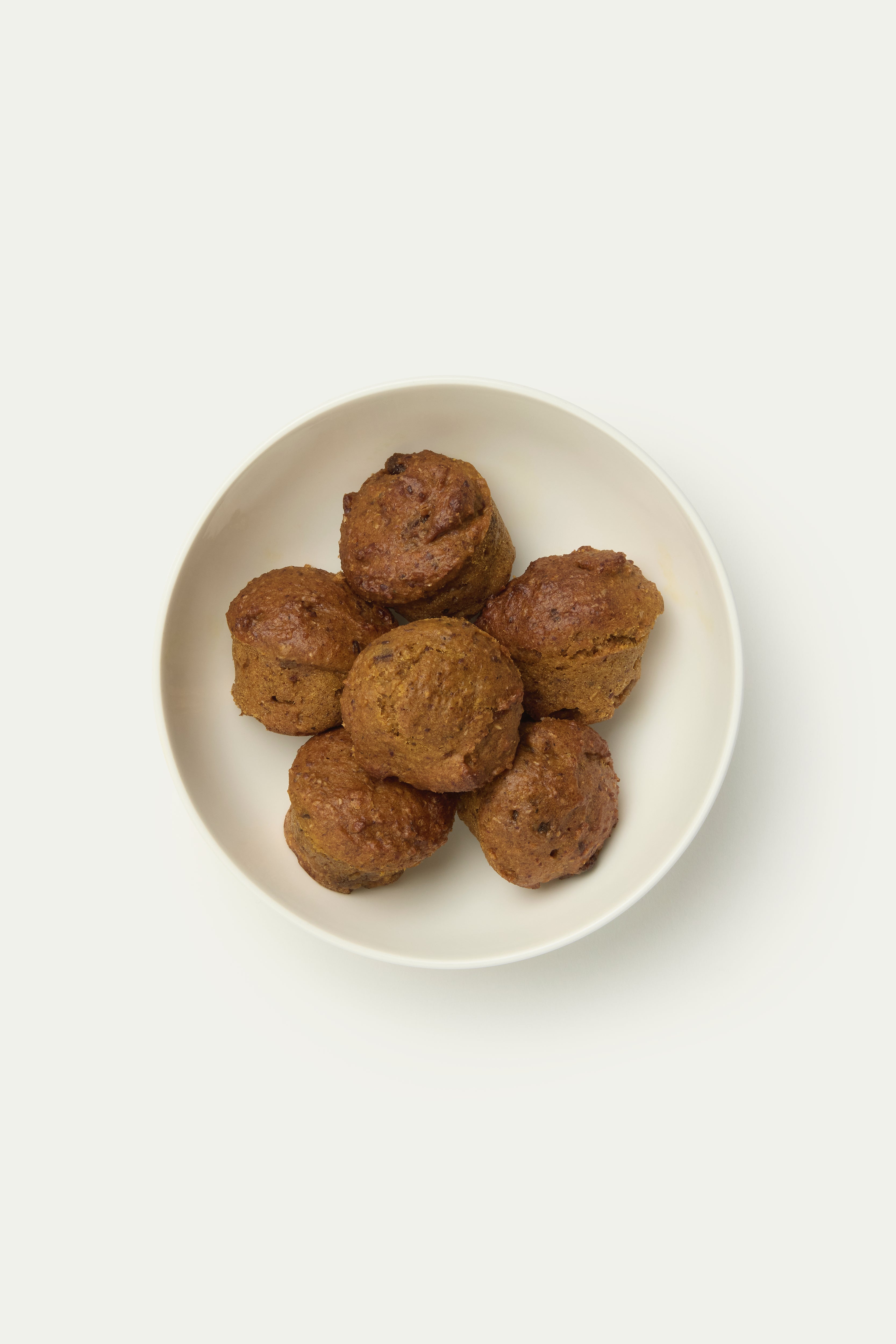 Pumpkin date and spice muffins in a bowl, toddler finger foods